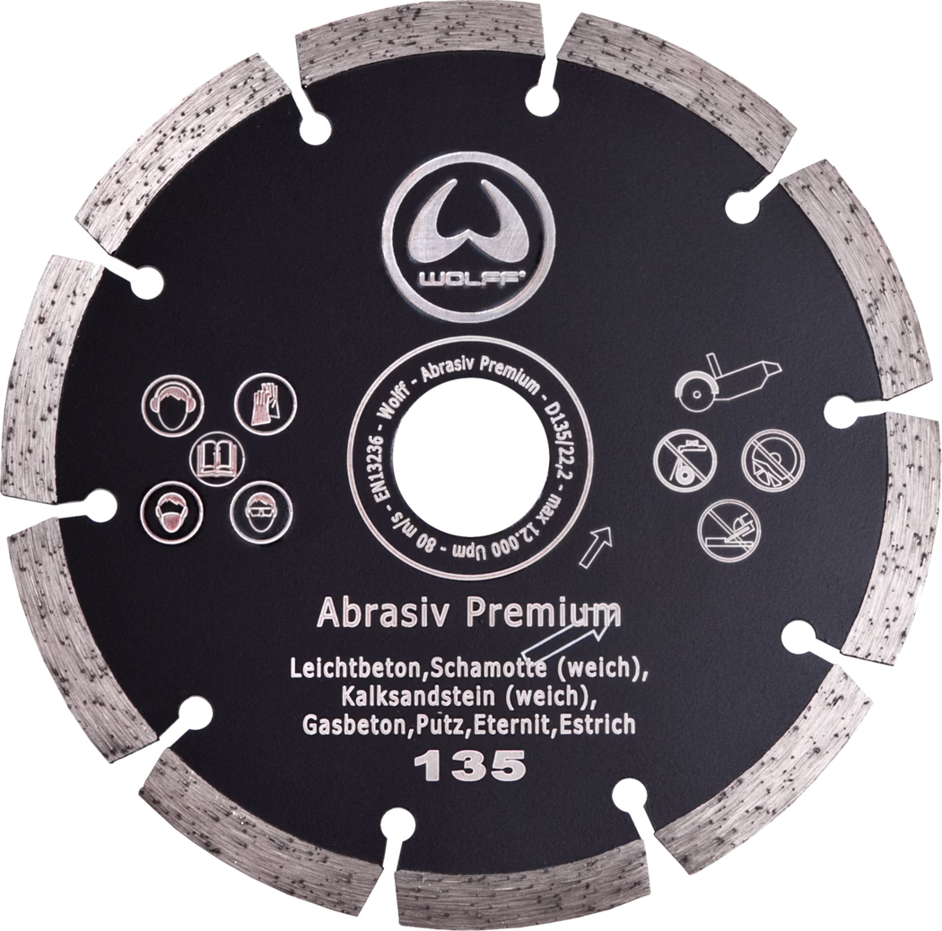 Disque de coupe diamant segmenté noir (135 mm) marqué 'Abrasiv Premium', adapté au béton léger, chamotte (molle), grès calcaire (mou), béton cellulaire, enduit, Eternit et chape; trou central de montage et pictogrammes de sécurité visibles.