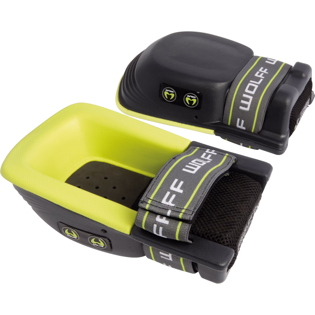 Gros plan sur une paire de genouillères de protection jaune vif et noire avec des sangles grises réglables portant le nom de la marque, des coques extérieures jaunes texturées, des coussinets intérieurs noirs perforés pour la ventilation et de petits boutons circulaires de marque sur le côté ; présenté sur fond blanc.
