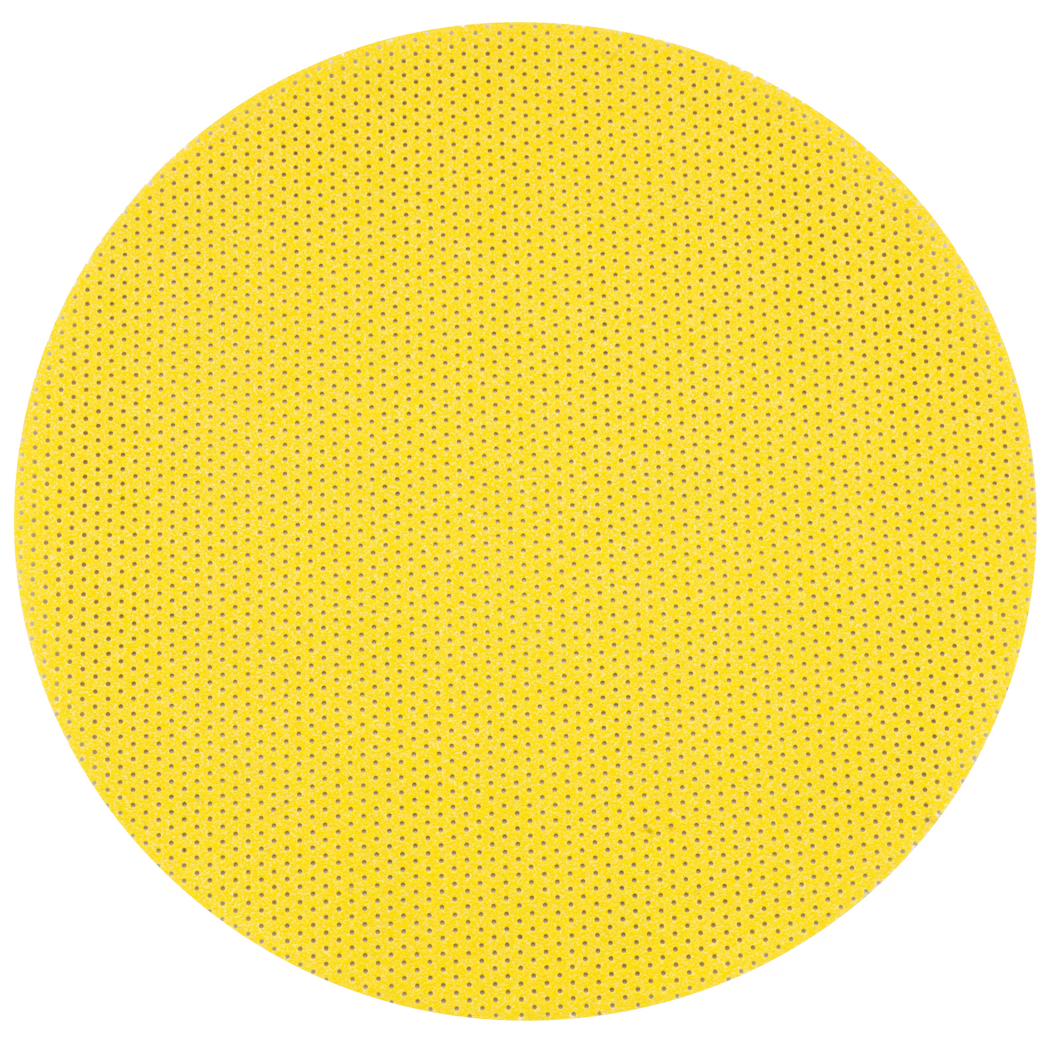 Un grand disque circulaire jaune texturé avec un motif régulier de petits trous, ressemblant à un disque abrasif ou à un filtre, sur fond blanc.